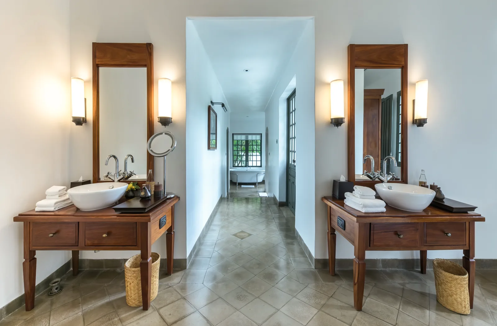 Luxury bathroom with twin basins polished after a detailed clean